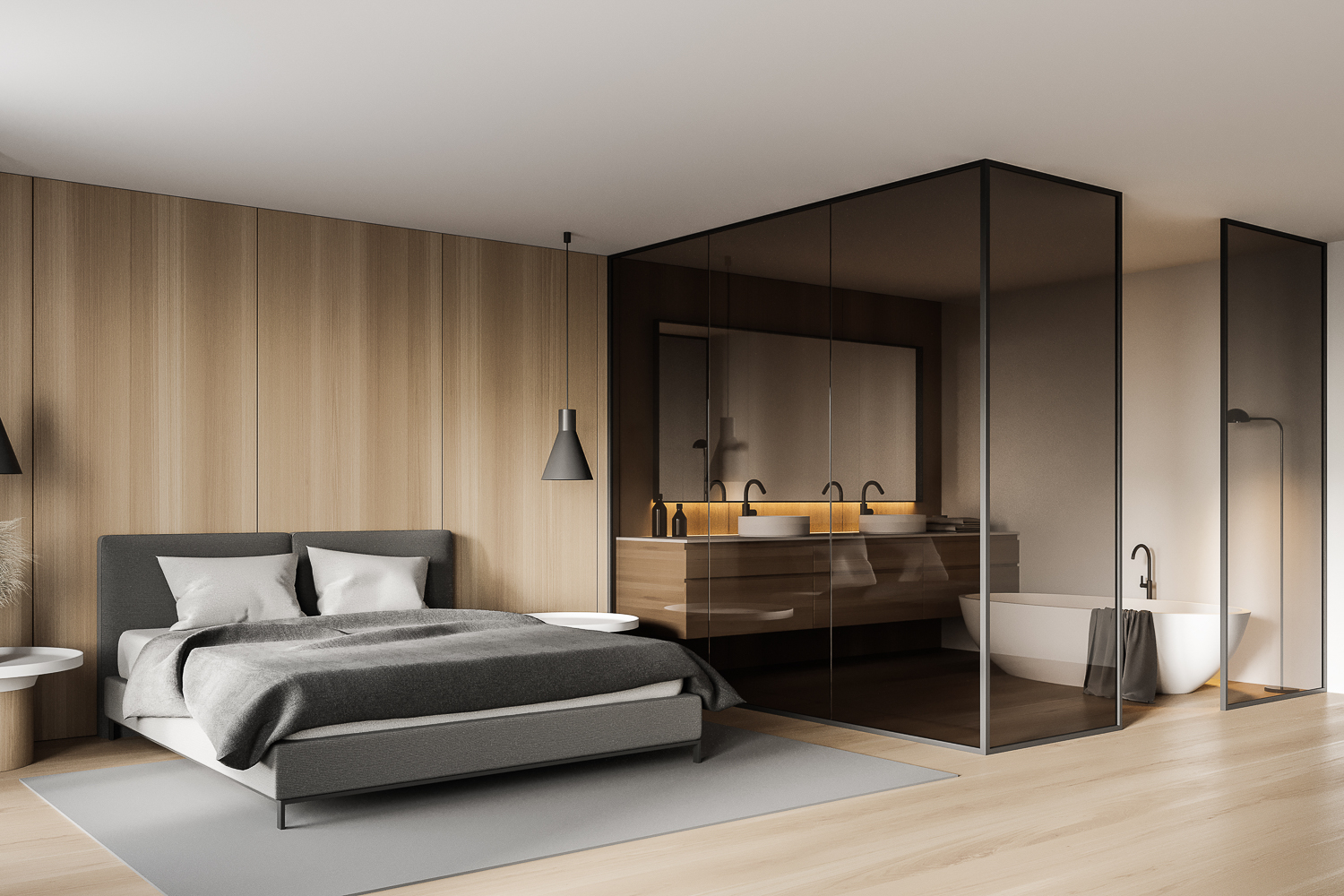 Bedroom with wood paneling and gray bedding featuring a bathroom with glass walls